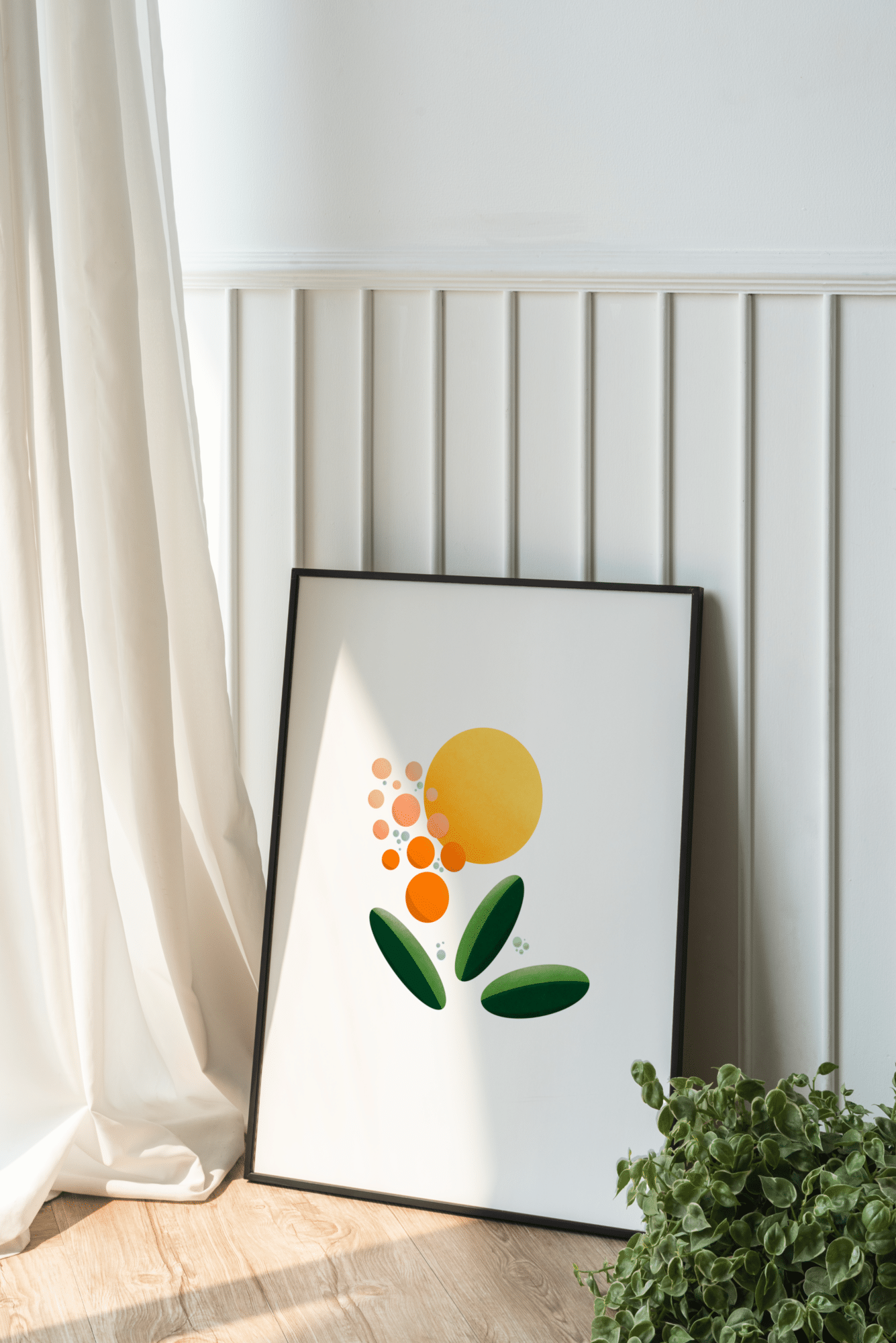 This print was inspired by the plant Pride of Barbados. It contains shapes similar to above, circles and ovals, but with colors of green, yellow, pink, and orange. The print sits on the ground against a white wall, a white curtain sits to the left of the print, and a green plant to the right.